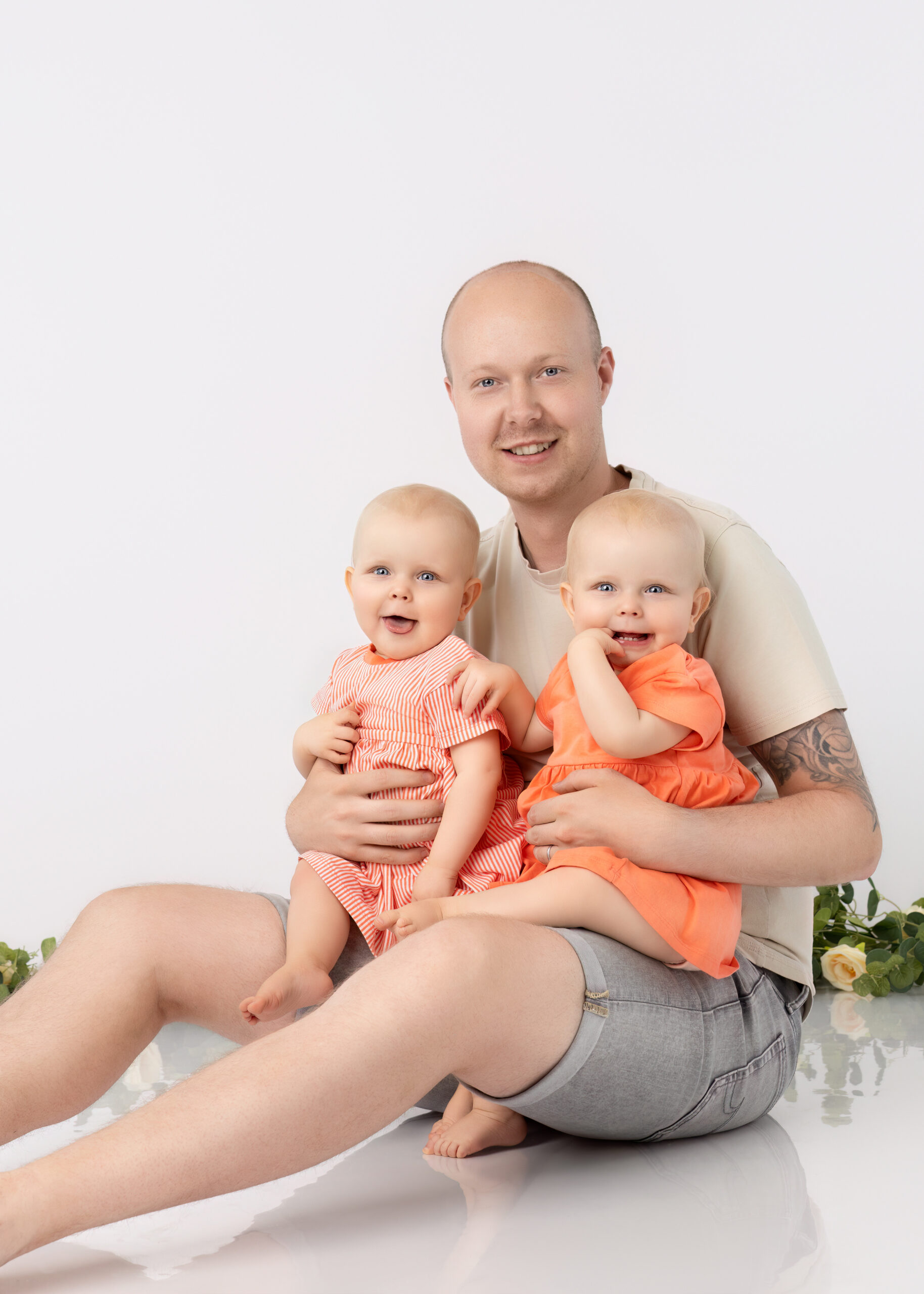 Papa met zijn kinderen tijdens gezinsfotografie in Zandhoven