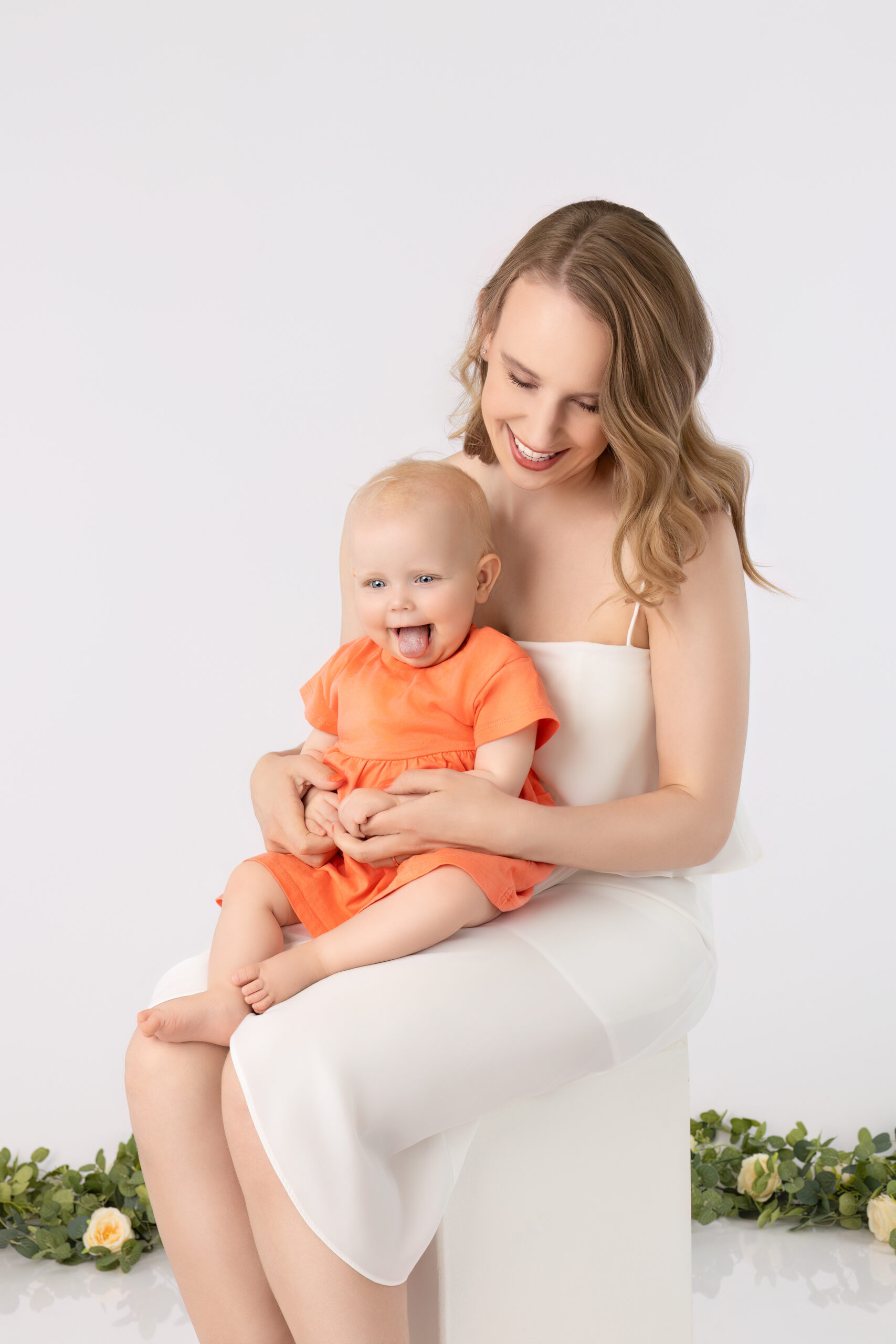 Mama met haar kindje tijdens een gezinsfotografie-ervaring in Zandhoven